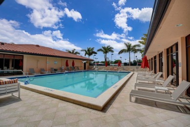 Welcome to this charming single-story home in the gated Barclay on PGA National Golf Club in Florida - for sale on GolfHomes.com, golf home, golf lot