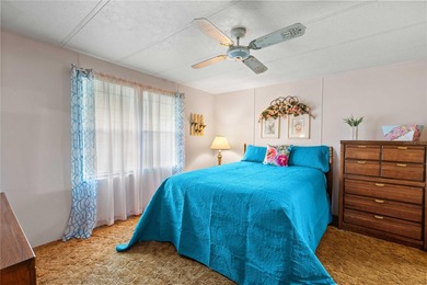 Are you looking for a cozy Florida retreat to escape the cold on Betmar Acres Golf Club in Florida - for sale on GolfHomes.com, golf home, golf lot