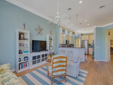 This pool home features a 2022 roof, laminate flooring on PGA Golf Club in PGA Village in Florida - for sale on GolfHomes.com, golf home, golf lot