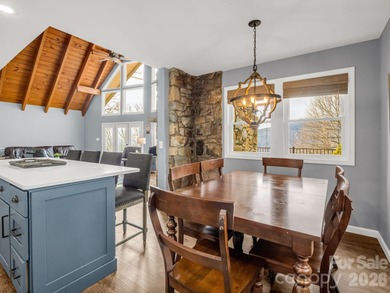 BIG VIEWS from this recently updated three-bedroom, two full on Rumbling Bald Resort on Lake Lure in North Carolina - for sale on GolfHomes.com, golf home, golf lot