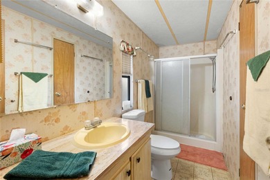 Are you looking for a cozy Florida retreat to escape the cold on Betmar Acres Golf Club in Florida - for sale on GolfHomes.com, golf home, golf lot