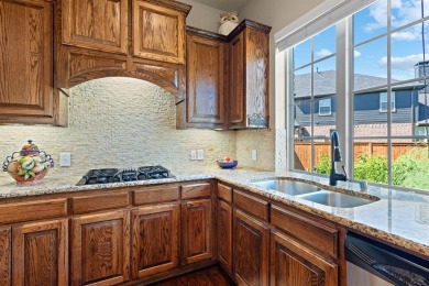 Tucked away on a peaceful cul-de-sac in Lantana, this charming on Lantana Golf Club in Texas - for sale on GolfHomes.com, golf home, golf lot