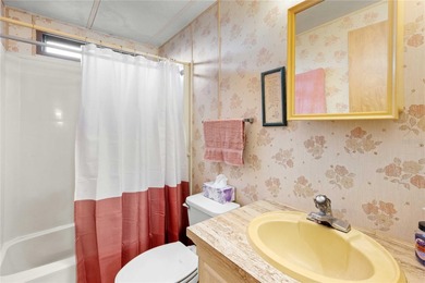 Are you looking for a cozy Florida retreat to escape the cold on Betmar Acres Golf Club in Florida - for sale on GolfHomes.com, golf home, golf lot