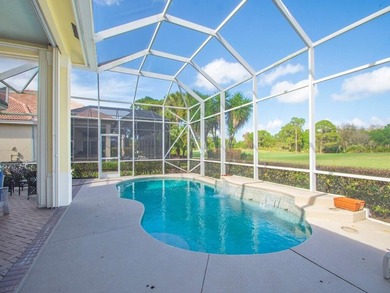 This pool home features a 2022 roof, laminate flooring on The Legacy Golf and Tennis Club in Florida - for sale on GolfHomes.com, golf home, golf lot