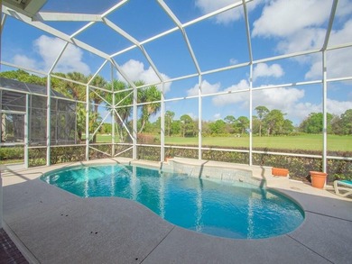 This pool home features a 2022 roof, laminate flooring on The Legacy Golf and Tennis Club in Florida - for sale on GolfHomes.com, golf home, golf lot