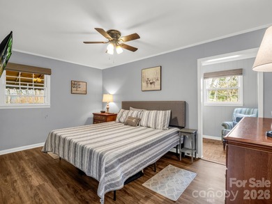 BIG VIEWS from this recently updated three-bedroom, two full on Rumbling Bald Resort on Lake Lure in North Carolina - for sale on GolfHomes.com, golf home, golf lot