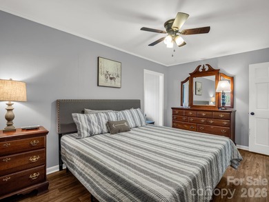 BIG VIEWS from this recently updated three-bedroom, two full on Rumbling Bald Resort on Lake Lure in North Carolina - for sale on GolfHomes.com, golf home, golf lot