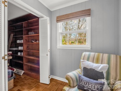 BIG VIEWS from this recently updated three-bedroom, two full on Rumbling Bald Resort on Lake Lure in North Carolina - for sale on GolfHomes.com, golf home, golf lot