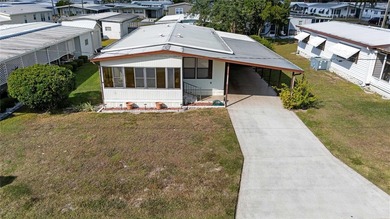 Are you looking for a cozy Florida retreat to escape the cold on Betmar Acres Golf Club in Florida - for sale on GolfHomes.com, golf home, golf lot