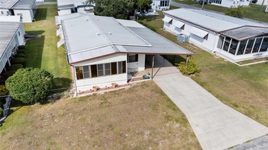 Are you looking for a cozy Florida retreat to escape the cold on Betmar Acres Golf Club in Florida - for sale on GolfHomes.com, golf home, golf lot