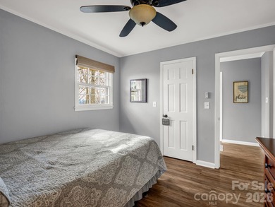 BIG VIEWS from this recently updated three-bedroom, two full on Rumbling Bald Resort on Lake Lure in North Carolina - for sale on GolfHomes.com, golf home, golf lot