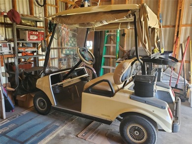 Are you looking for a cozy Florida retreat to escape the cold on Betmar Acres Golf Club in Florida - for sale on GolfHomes.com, golf home, golf lot