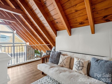 BIG VIEWS from this recently updated three-bedroom, two full on Rumbling Bald Resort on Lake Lure in North Carolina - for sale on GolfHomes.com, golf home, golf lot