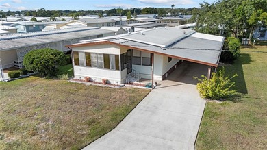 Are you looking for a cozy Florida retreat to escape the cold on Betmar Acres Golf Club in Florida - for sale on GolfHomes.com, golf home, golf lot