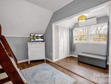 BIG VIEWS from this recently updated three-bedroom, two full on Rumbling Bald Resort on Lake Lure in North Carolina - for sale on GolfHomes.com, golf home, golf lot