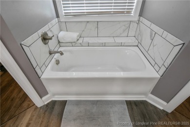 Here it is... an amazing, exclusive cul-de-sac home overlooking on Anderson Creek Golf Club in North Carolina - for sale on GolfHomes.com, golf home, golf lot