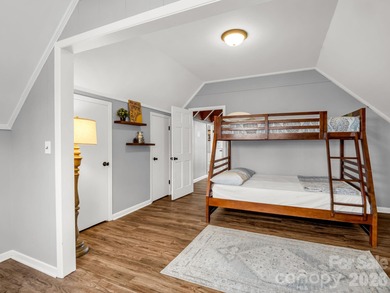 BIG VIEWS from this recently updated three-bedroom, two full on Rumbling Bald Resort on Lake Lure in North Carolina - for sale on GolfHomes.com, golf home, golf lot