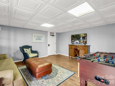 BIG VIEWS from this recently updated three-bedroom, two full on Rumbling Bald Resort on Lake Lure in North Carolina - for sale on GolfHomes.com, golf home, golf lot