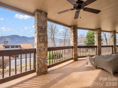 BIG VIEWS from this recently updated three-bedroom, two full on Rumbling Bald Resort on Lake Lure in North Carolina - for sale on GolfHomes.com, golf home, golf lot