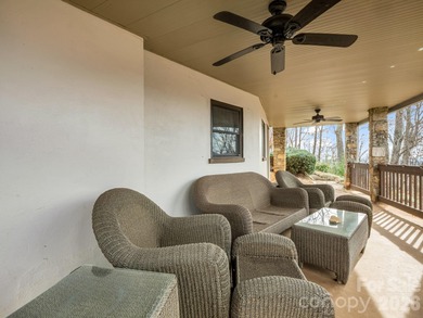 BIG VIEWS from this recently updated three-bedroom, two full on Rumbling Bald Resort on Lake Lure in North Carolina - for sale on GolfHomes.com, golf home, golf lot