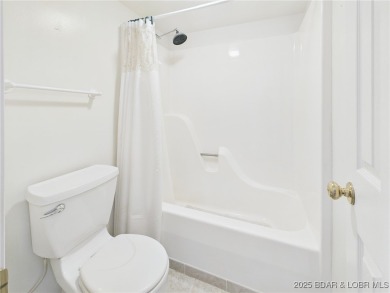 Welcome to this beautifully maintained 3-bedroom, 2.5 bath home on Indian Rock Golf Club in Missouri - for sale on GolfHomes.com, golf home, golf lot