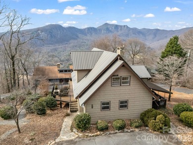 BIG VIEWS from this recently updated three-bedroom, two full on Rumbling Bald Resort on Lake Lure in North Carolina - for sale on GolfHomes.com, golf home, golf lot