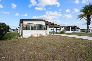 Are you looking for a cozy Florida retreat to escape the cold on Betmar Acres Golf Club in Florida - for sale on GolfHomes.com, golf home, golf lot