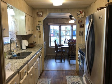 This two bedroom, two bath home is ready to be yours. The AC was on Fairways Country Club in Florida - for sale on GolfHomes.com, golf home, golf lot