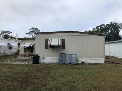 This two bedroom, two bath home is ready to be yours. The AC was on Fairways Country Club in Florida - for sale on GolfHomes.com, golf home, golf lot