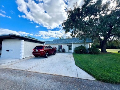 This spacious CORNER Unit located on the 14th Hole of Seven on Seven Springs Golf and Country Club in Florida - for sale on GolfHomes.com, golf home, golf lot