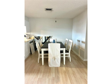 This spacious CORNER Unit located on the 14th Hole of Seven on Seven Springs Golf and Country Club in Florida - for sale on GolfHomes.com, golf home, golf lot