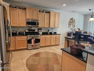 Beautiful Gala Model Sun City Festival home features a Front on Copper Canyon Golf Club in Arizona - for sale on GolfHomes.com, golf home, golf lot