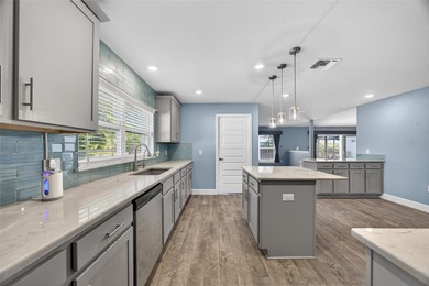 DEEP CREEK! Updated 4-bedroom, 3-bath, oversized 2-car garage on Deep Creek Golf Club in Florida - for sale on GolfHomes.com, golf home, golf lot