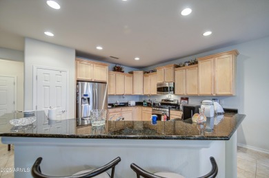 Beautiful Gala Model Sun City Festival home features a Front on Copper Canyon Golf Club in Arizona - for sale on GolfHomes.com, golf home, golf lot