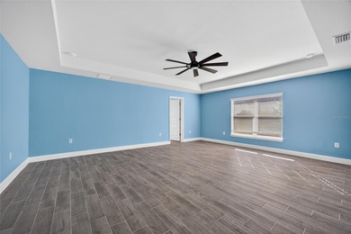 DEEP CREEK! Updated 4-bedroom, 3-bath, oversized 2-car garage on Deep Creek Golf Club in Florida - for sale on GolfHomes.com, golf home, golf lot