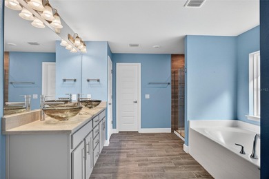 DEEP CREEK! Updated 4-bedroom, 3-bath, oversized 2-car garage on Deep Creek Golf Club in Florida - for sale on GolfHomes.com, golf home, golf lot