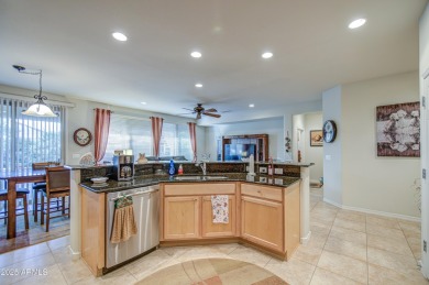 Beautiful Gala Model Sun City Festival home features a Front on Copper Canyon Golf Club in Arizona - for sale on GolfHomes.com, golf home, golf lot