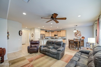 Beautiful Gala Model Sun City Festival home features a Front on Copper Canyon Golf Club in Arizona - for sale on GolfHomes.com, golf home, golf lot