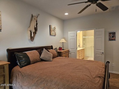 Beautiful Gala Model Sun City Festival home features a Front on Copper Canyon Golf Club in Arizona - for sale on GolfHomes.com, golf home, golf lot