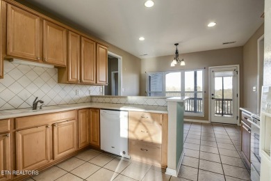 This very well maintained basement rancher features 4 bedrooms on Toqua Golf Course - Loudon County in Tennessee - for sale on GolfHomes.com, golf home, golf lot