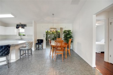 UPGRADES abound on this lovely BOND PAID  3-bed, 2-bath AMARILLO on The Links of Spruce Creek in Florida - for sale on GolfHomes.com, golf home, golf lot