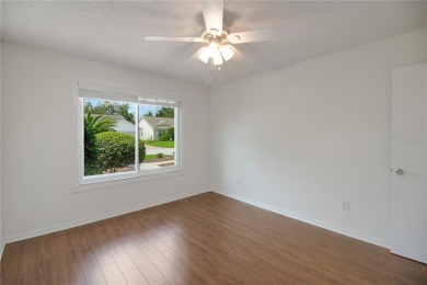 UPGRADES abound on this lovely BOND PAID  3-bed, 2-bath AMARILLO on The Links of Spruce Creek in Florida - for sale on GolfHomes.com, golf home, golf lot