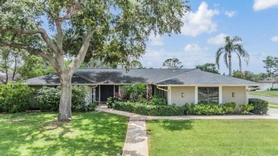 Discover this beautifully updated, move-in-ready pool home on East Lake Woodlands Country Club in Florida - for sale on GolfHomes.com, golf home, golf lot