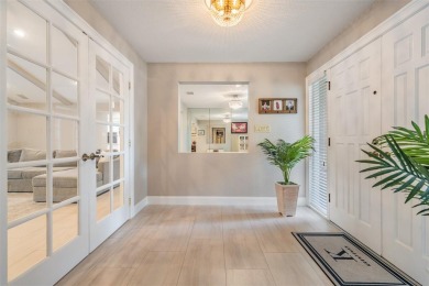 Discover this beautifully updated, move-in-ready pool home on East Lake Woodlands Country Club in Florida - for sale on GolfHomes.com, golf home, golf lot
