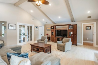 Discover this beautifully updated, move-in-ready pool home on East Lake Woodlands Country Club in Florida - for sale on GolfHomes.com, golf home, golf lot
