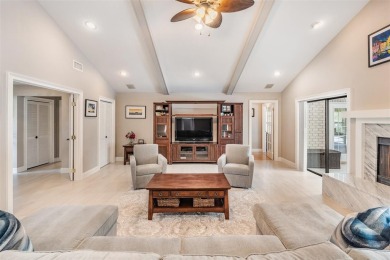 Discover this beautifully updated, move-in-ready pool home on East Lake Woodlands Country Club in Florida - for sale on GolfHomes.com, golf home, golf lot