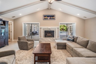 Discover this beautifully updated, move-in-ready pool home on East Lake Woodlands Country Club in Florida - for sale on GolfHomes.com, golf home, golf lot