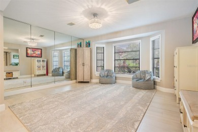 Discover this beautifully updated, move-in-ready pool home on East Lake Woodlands Country Club in Florida - for sale on GolfHomes.com, golf home, golf lot