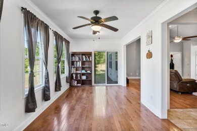 Welcome to your own 3-bedroom, 2-bath country retreat, perfectly on Carolina Lakes Country Club in North Carolina - for sale on GolfHomes.com, golf home, golf lot