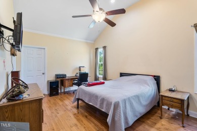 Welcome to your own 3-bedroom, 2-bath country retreat, perfectly on Carolina Lakes Country Club in North Carolina - for sale on GolfHomes.com, golf home, golf lot